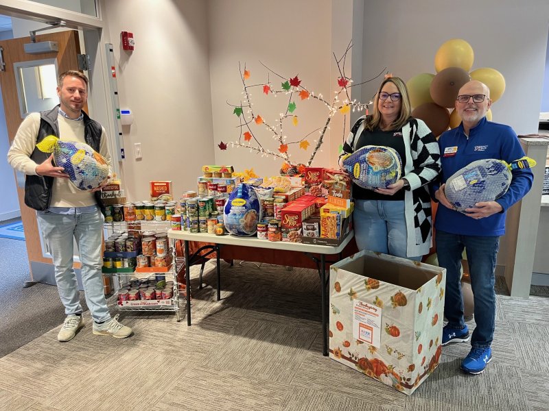 Bank representatives shown with donated food items are (l-r) Tyler Stetz, Community Reinvestment Act officer; Pam Varvaro, Lewes branch manager; and Keith Bradley-Wilkerson, Lewes teller. SUBMITTED PHOTO